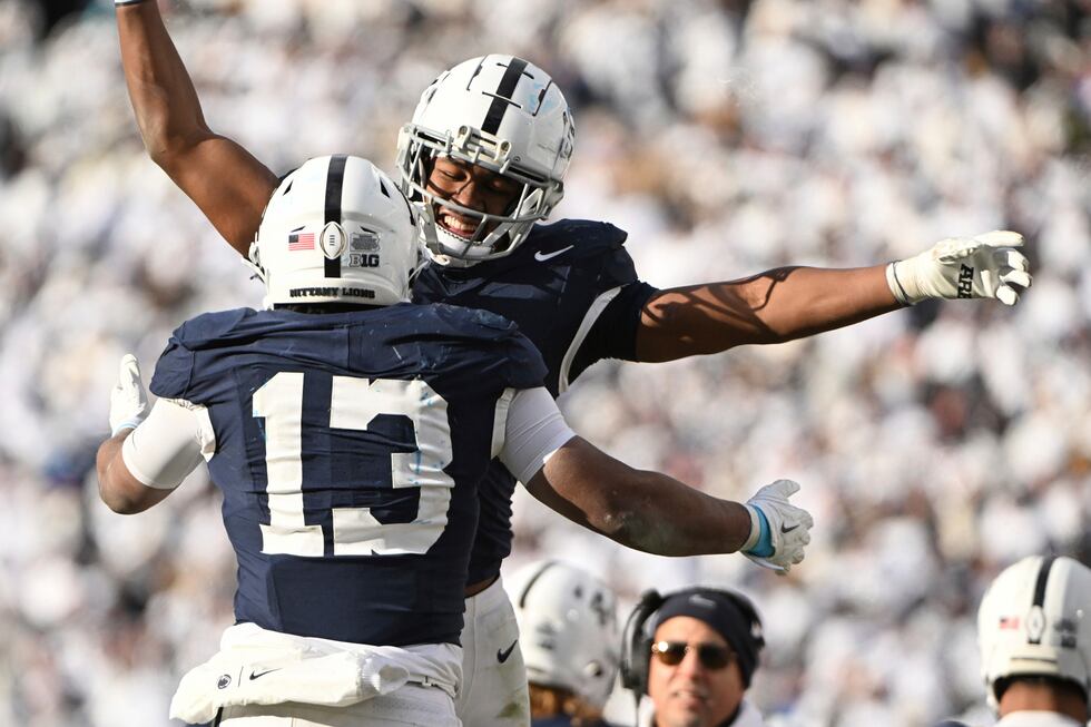 Penn State running back Kaytron Allen (13) celebrates after a touchdown with Nicholas...