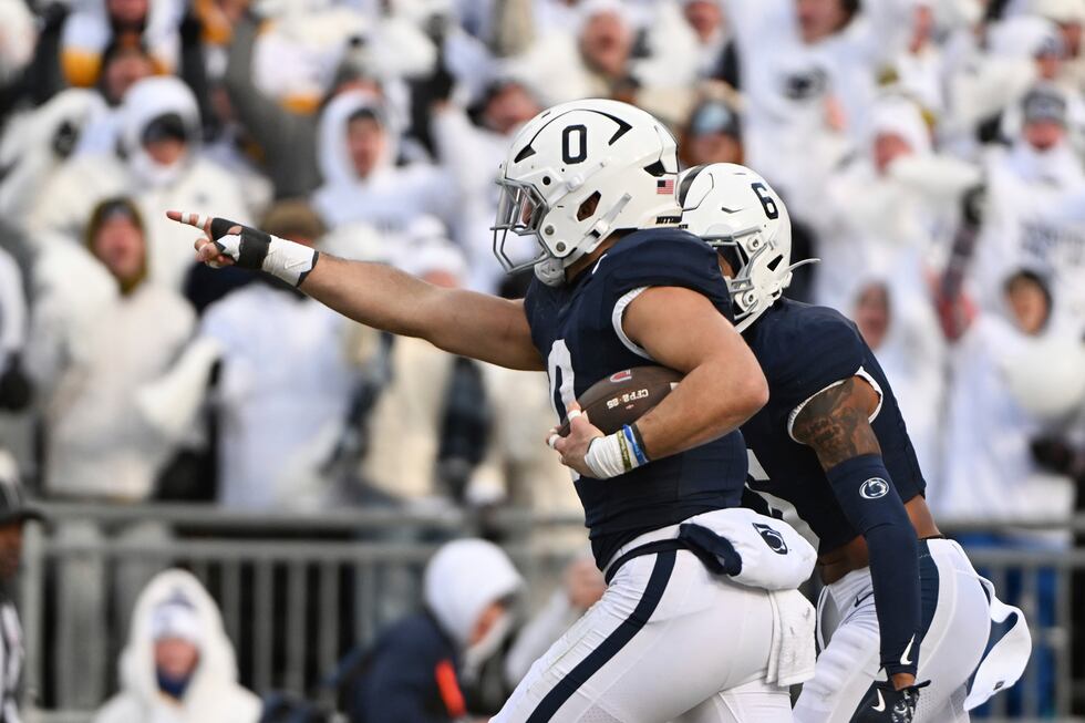 Penn State linebacker Dominic DeLuca celebrates an interception for a touchdown against SMU...