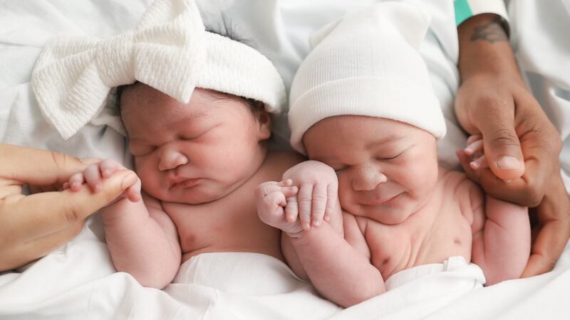 Photographed at Yale New Haven are, from left: daughter Souli Morris, born at 12:02 am on Jan....