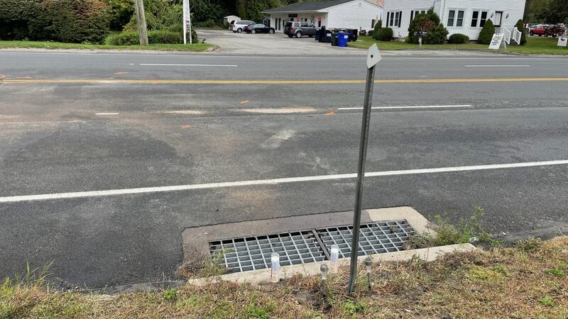 Candles were placed near the crash site along Route 7 in New Milford.