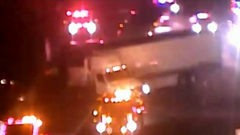 State troopers initially said an oil spill in the roadway caused the crash in Bridgeport,...