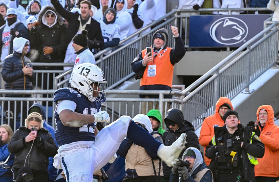 Penn State running back Kaytron Allen celebrates a touchdown against SMU during the first half...