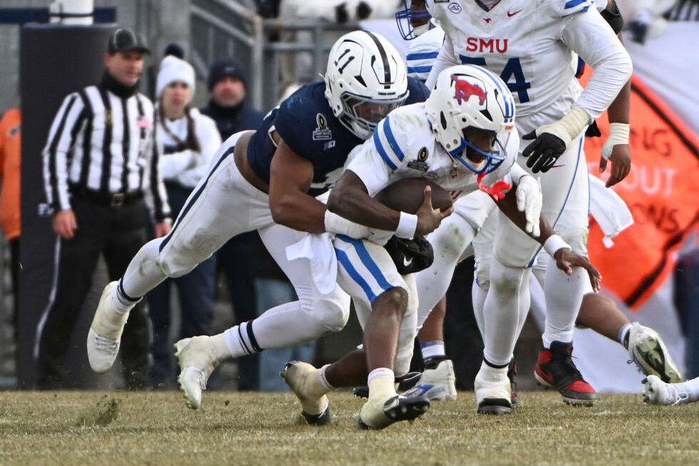 Penn State defensive end Abdul Carter sacks SMU quarterback Kevin Jennings during the second...