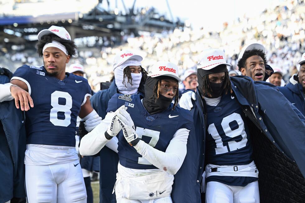 Penn State players celebrate after their win over SMU in the first round of the College...