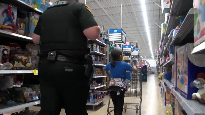 Denison first responders spread holiday joy, host annual Shop with a Cop